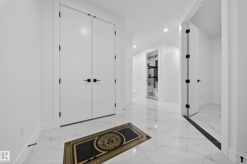 White interior doors with matte black hardware - 4005 39 Street, Beaumont, AB - Indoor