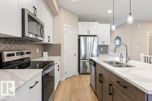 29 Ratelle Circle, St. Albert, AB - Indoor Photo Showing Kitchen With Double Sink With Upgraded Kitchen