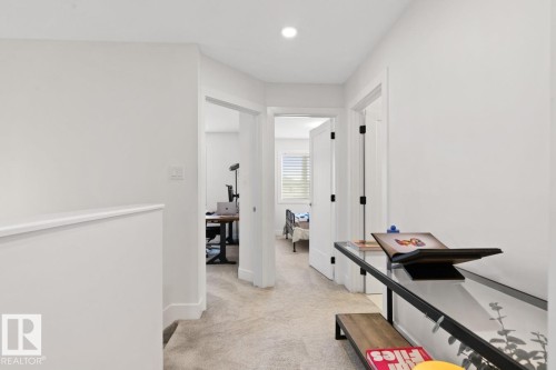 Hallway featuring light-colored carpeting, white walls, recessed lighting, and white trim - 6023 180 Avenue, Edmonton, AB - Indoor Photo Showing Other Room