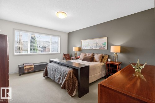 Interior room featuring light-colored carpet flooring and a neutral color palette - 2178 Haddow Drive, Edmonton, AB - Indoor Photo Showing Bedroom