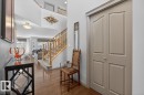Entryway with wood-finish flooring, light-toned walls, and a two-story ceiling - 2178 Haddow Drive, Edmonton, AB  - Indoor Photo Showing Other Room 