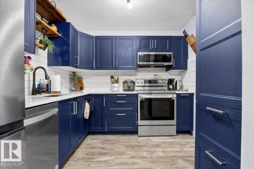 256 Callingwood Place, Edmonton, AB - Indoor Photo Showing Kitchen With Upgraded Kitchen