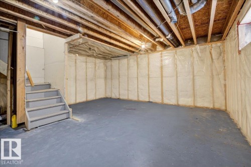 Unfinished below grade area featuring stairs - 150 Acacia Circle, Leduc, AB - Indoor Photo Showing Basement