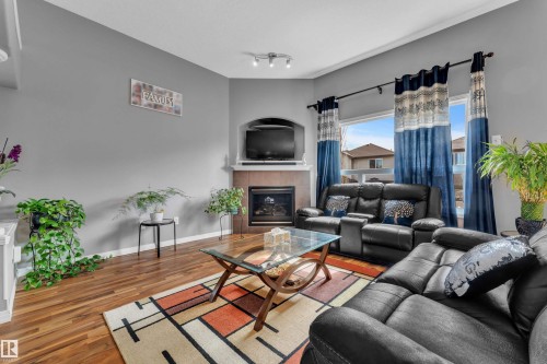 4617 163A Avenue, Edmonton, AB - Indoor Photo Showing Living Room With Fireplace