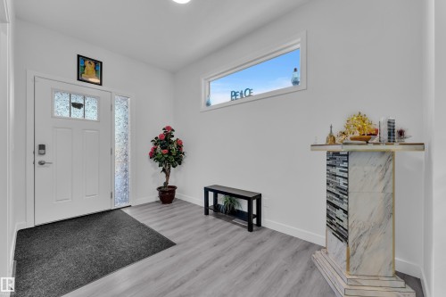 196 Edgewater Circle, Leduc, AB - Indoor Photo Showing Other Room With Fireplace