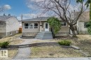 Bungalow exterior featuring a brick facade, white trim windows, and a paved walkway - 10756 133 Street, Edmonton, AB  - Outdoor 
