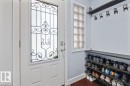 Entryway featuring a white door with decorative wrought iron detailing and frosted glass - 10756 133 Street, Edmonton, AB  - Indoor Photo Showing Other Room 