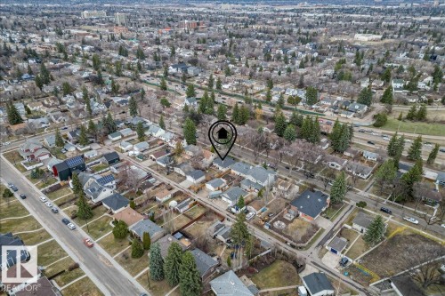 Aerial perspective showcasing a residential area with mature trees and established properties - 10756 133 Street, Edmonton, AB -  With View