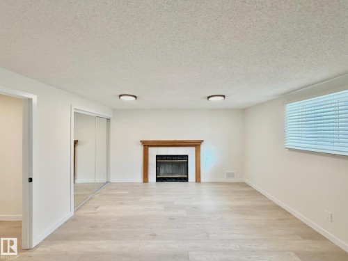 14309 128A Street, Edmonton, AB - Indoor Photo Showing Other Room With Fireplace