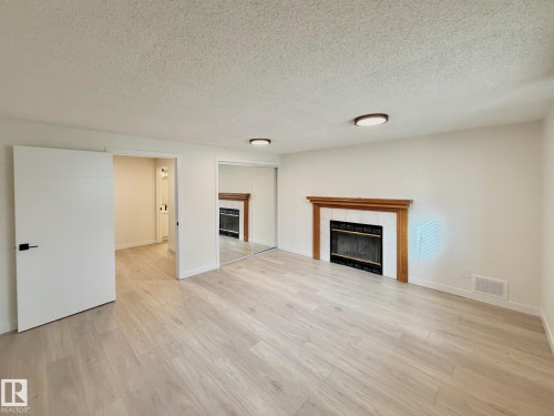 14309 128A Street, Edmonton, AB - Indoor Photo Showing Living Room With Fireplace