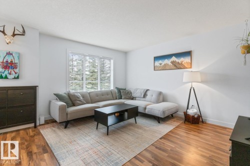 13 4950 Terwillegar Common, Edmonton, AB - Indoor Photo Showing Living Room
