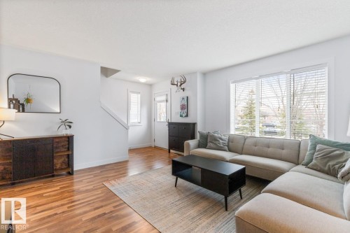 13 4950 Terwillegar Common, Edmonton, AB - Indoor Photo Showing Living Room