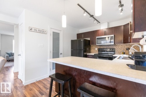13 4950 Terwillegar Common, Edmonton, AB - Indoor Photo Showing Kitchen