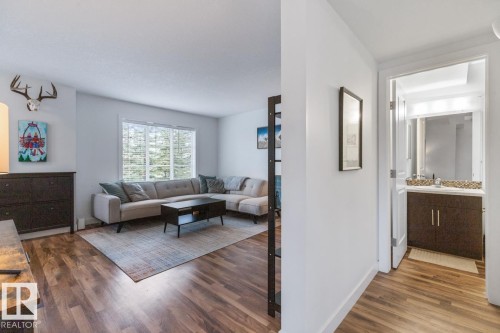 13 4950 Terwillegar Common, Edmonton, AB - Indoor Photo Showing Living Room