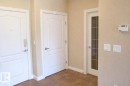 310 1406 Hodgson Way, Edmonton, AB  - Indoor Photo Showing Other Room 