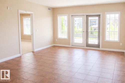310 1406 Hodgson Way, Edmonton, AB - Indoor Photo Showing Other Room