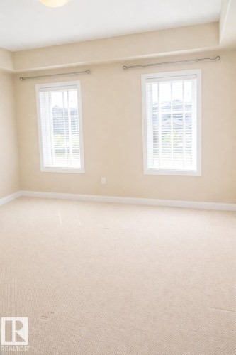 310 1406 Hodgson Way, Edmonton, AB - Indoor Photo Showing Other Room