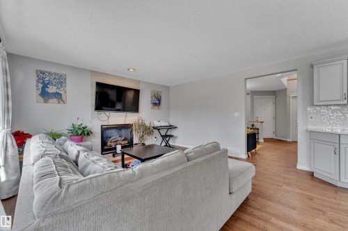 1235 Rutherford Road Sw, Edmonton, AB - Indoor Photo Showing Living Room With Fireplace