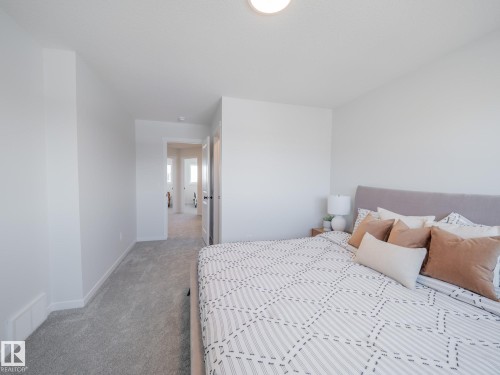 54 Brougham Drive, Ardrossan, AB - Indoor Photo Showing Bedroom