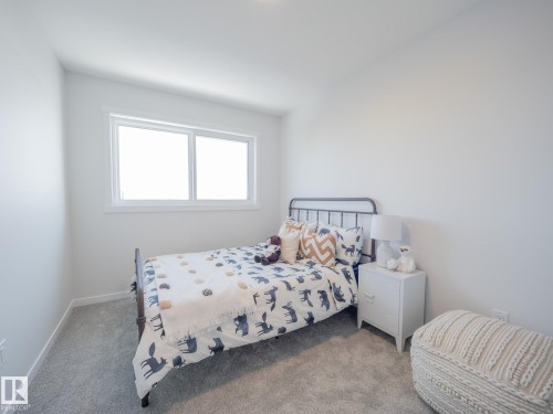 54 Brougham Drive, Ardrossan, AB - Indoor Photo Showing Bedroom