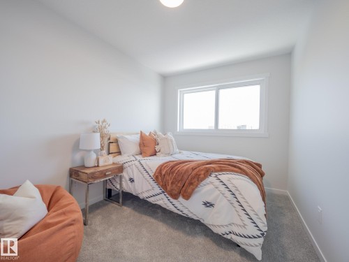 54 Brougham Drive, Ardrossan, AB - Indoor Photo Showing Bedroom