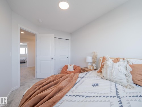 54 Brougham Drive, Ardrossan, AB - Indoor Photo Showing Bedroom