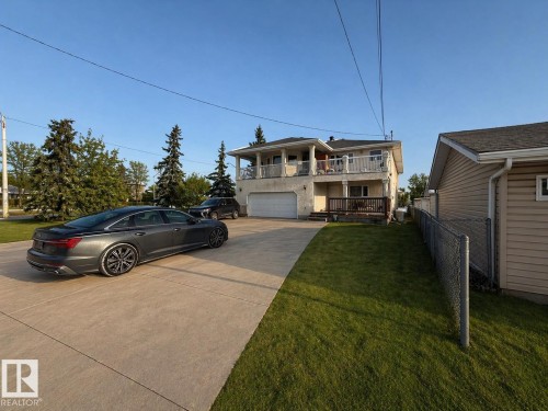Green grass and driveway digitally added - 10644 155 Street, Edmonton, AB - Outdoor With Balcony