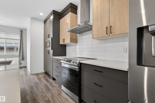 2937 Coughlan Green, Edmonton, AB - Indoor Photo Showing Kitchen With Upgraded Kitchen