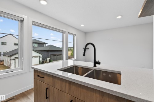 2937 Coughlan Green, Edmonton, AB - Indoor Photo Showing Kitchen With Double Sink