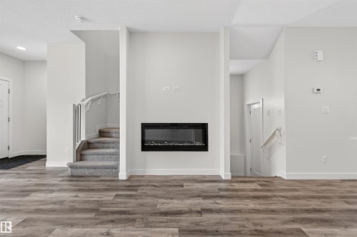 2937 Coughlan Green, Edmonton, AB - Indoor Photo Showing Other Room With Fireplace