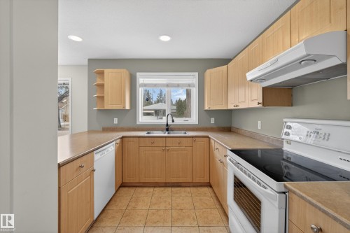 8721 88 Avenue, Edmonton, AB - Indoor Photo Showing Kitchen With Double Sink