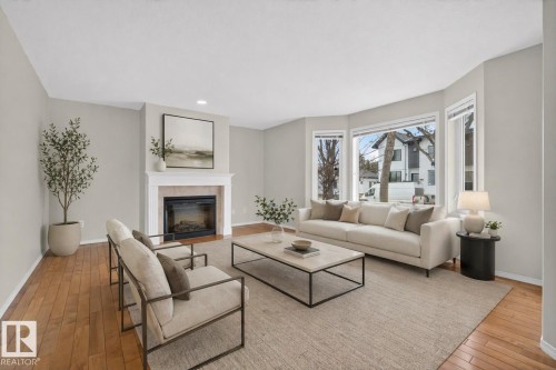 8721 88 Avenue, Edmonton, AB - Indoor Photo Showing Living Room With Fireplace