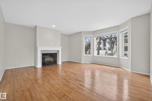8721 88 Avenue, Edmonton, AB - Indoor Photo Showing Living Room With Fireplace