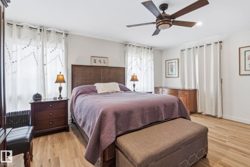 Bedroom featuring light wood-finish flooring, white walls, and recessed lighting - 23127 Twp Rd 502, Rural Leduc County, AB - Indoor Photo Showing Bedroom