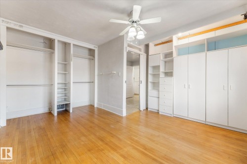 Hardwood flooring extending throughout the space - 10921 126 Street, Edmonton, AB - Indoor Photo Showing Other Room