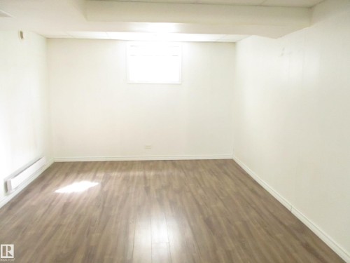 Located in basement unit - 12115 64 Street Nw, Edmonton, AB - Indoor Photo Showing Other Room