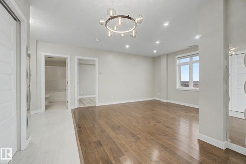 1225 5151 Windermere Boulevard, Edmonton, AB - Indoor Photo Showing Other Room