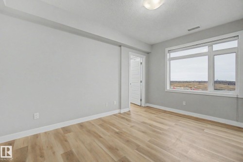 1225 5151 Windermere Boulevard, Edmonton, AB - Indoor Photo Showing Other Room