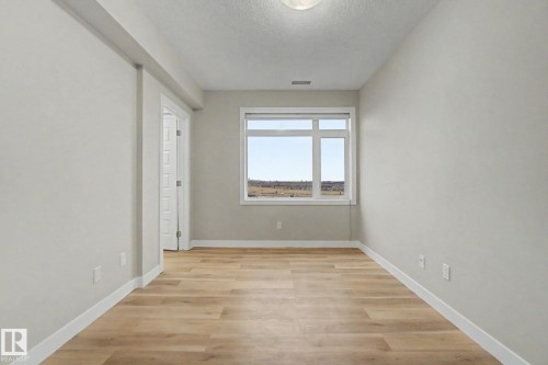 1225 5151 Windermere Boulevard, Edmonton, AB - Indoor Photo Showing Other Room