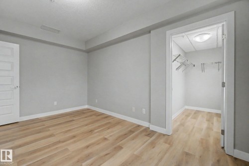 1225 5151 Windermere Boulevard, Edmonton, AB - Indoor Photo Showing Other Room