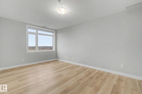 1225 5151 Windermere Boulevard, Edmonton, AB - Indoor Photo Showing Other Room