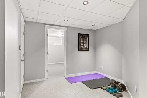 Finished room with light grey walls, white trim, recessed lighting, and grey carpet flooring - 14755 131 Street Nw, Edmonton, AB - Indoor Photo Showing Other Room