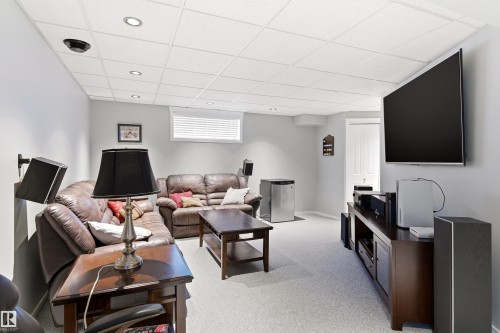 Finished basement area featuring recessed lighting, light gray walls, and light-colored carpeting - 14755 131 Street Nw, Edmonton, AB - Indoor
