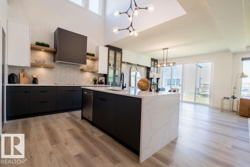 102 Bluff Cove, Leduc, AB - Indoor Photo Showing Kitchen With Upgraded Kitchen