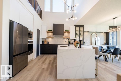 102 Bluff Cove, Leduc, AB - Indoor Photo Showing Kitchen With Upgraded Kitchen