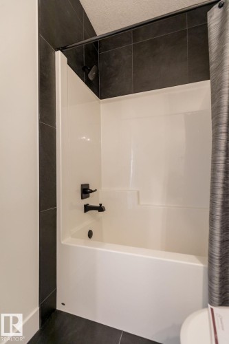 102 Bluff Cove, Leduc, AB - Indoor Photo Showing Bathroom