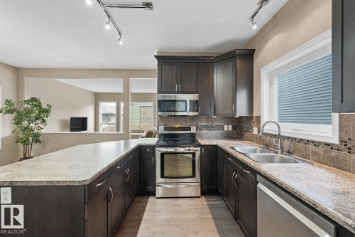 4629 Crabapple Run, Edmonton, AB - Indoor Photo Showing Kitchen With Stainless Steel Kitchen With Double Sink