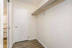 Closet space featuring a single shelf and hanging rod - 