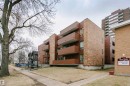 Mid-rise building featuring brick and wood-panel exterior - 303 10026 112 Street, Edmonton, AB  - Outdoor 