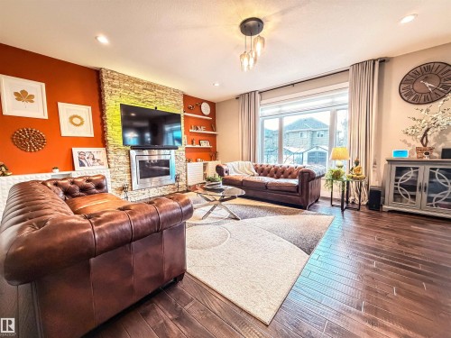 9004 24 Avenue, Edmonton, AB - Indoor Photo Showing Living Room With Fireplace